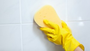 3663262-close-up-of-a-woman-cleaning-a-bathroom